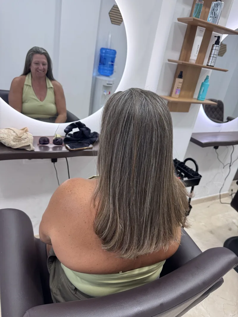 Shoulder-length highlighted hair